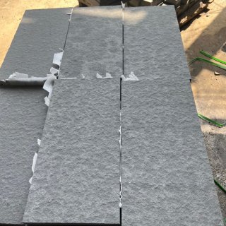 Dark grey basalt flamed surface 